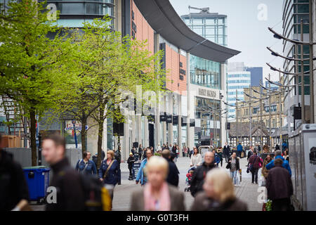 Manchester cathedral walk from St Ann's Square People crowds many crowded community communities lots many gathered gathering gro Stock Photo