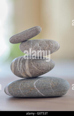 Balanced stack of pebbles isolated Stock Photo