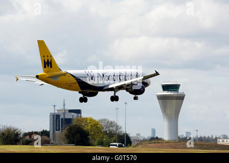 Monarch Airlines Airbus A320 landing at Birmingham Airport, UK Stock Photo
