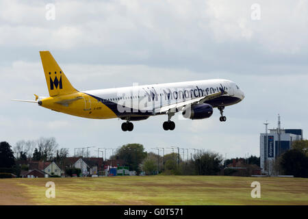 Monarch Airlines Airbus A321 landing at Birmingham Airport, UK Stock Photo