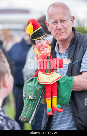 Hand Puppeteer at Rushden Cavalcade, steam rally and county fayre. Stock Photo