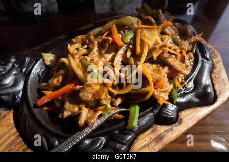 Chinese food. Stir fry beef with vegetables sauce. Stock Photo