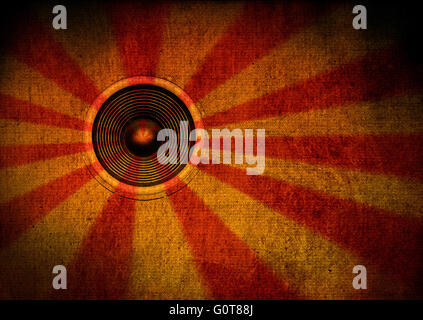 Red and yellow grunge sunburst music speaker Stock Photo