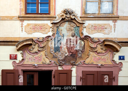 Fresco on wall of U Cerného Vola (The Black Ox) at Loretanska street, Prague, Czech Republic Stock Photo