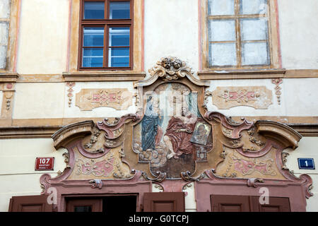 Fresco on wall of U Cerného Vola (The Black Ox) at Loretanska street, Prague, Czech Republic Stock Photo