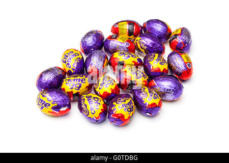 Cadbury's cream eggs, Chocolate Easter eggs isolated on a white studio background. Stock Photo