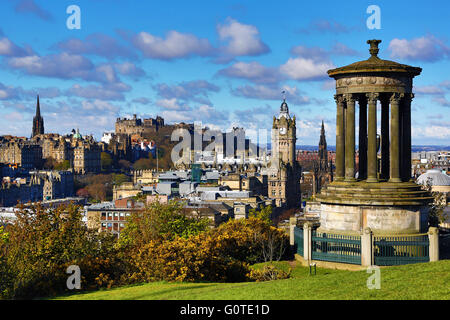 General city skyline view from Calton Hill showing the Dugald Stewart Monument and Edinburgh Castle in Edinburgh, Scotland, UK Stock Photo