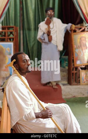 WUKRO, ETHIOPIA-MARCH 29: Orthodox christian devotees attend religious services dressed in gabi-white clothes on March 29, 2013 Stock Photo