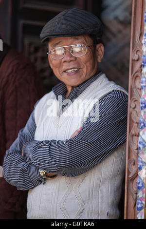 Unidentified Vietnamese old man pose for camera during local ceremony in Dalat City. Stock Photo