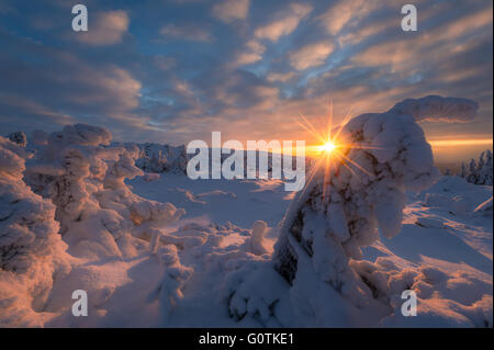 Sunset over snow covered landscape, Norway Stock Photo