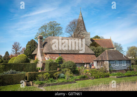 The Clergy House and St. Andrew's Church at Alfriston, East Sussex, UK Stock Photo