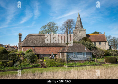 The Clergy House and St. Andrew's Church at Alfriston, East Sussex, UK Stock Photo