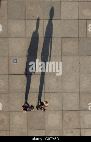 Long shadows of two people from above - aerial Stock Photo - Alamy