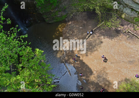 Looking down at hikers in Wildcat Canyon at Starved Rock State Park on the banks of the Illinois River.