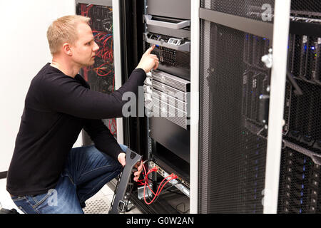 It technician maintain servers an SAN in datacenter Stock Photo