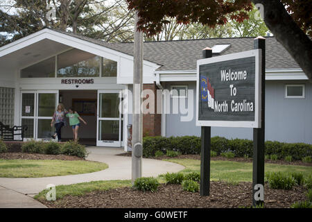 Grover, NC, USA. 15th Apr, 2016. State-owned public facilities at rest stop outside Charlotte, NC. The state's recent anti-LGBT laws, dubbed 'bathroom bill' restricts transgender individuals from using what many residents in state feel would be the appropriate gendered restroom to use depending on the person's gender identity and presentation. The law has unleashed a firestorm of protests against the law, including jobs and lost business growth in the state. © Robin Rayne Nelson/ZUMA Wire/Alamy Live News Stock Photo