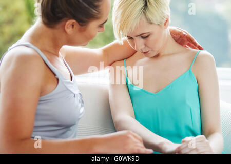 Woman consoling another Stock Photo