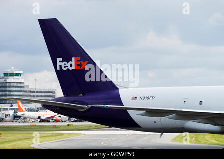 Fedex Boeing 757-27BSF Cargo Airliner N916FD Under Tow at Manchester International Airport England United Kingdom UK Stock Photo