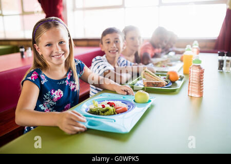 A Children Eating in the Canteen · Free Stock Photo