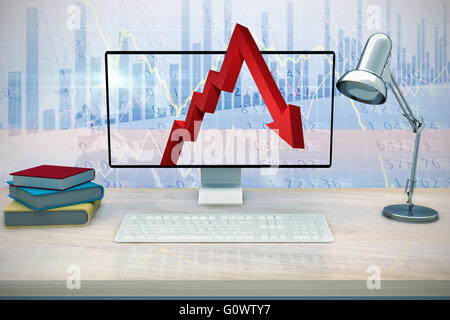 Composite image of a computer over a desk Stock Photo