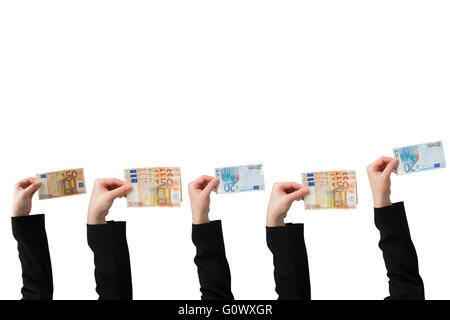 Businesswomans hand holding fifty euro notes Stock Photo