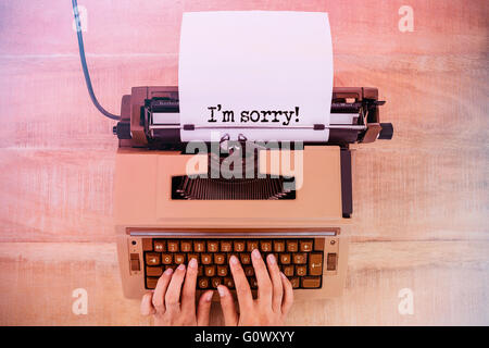 Composite image of the sentence i am sorry against white background Stock Photo