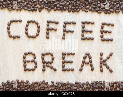 Word coffee break made from coffee beans with borders, top view Stock Photo