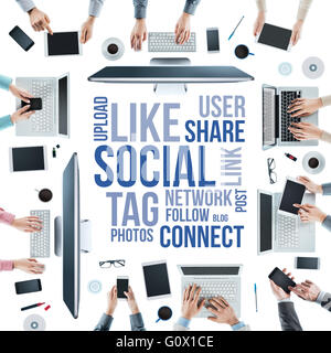 Business people social networking and using computers and touch screen tablets and smartphones, text concepts at center Stock Photo