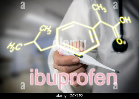 Doctor holding thermometer, the chemical formula of ibuprofen Stock Photo