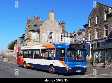 Stagecoach single deck bus in Arnside, Cumbria with a service to Kendal on a sunny day. Stock Photo