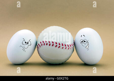 two eggs look missed at a baseball ball Stock Photo
