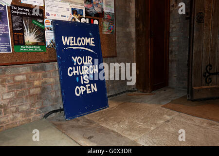 A 'welcome your church is open' sign at St Mary's Church in Kemptown, Brighton, East Sussex, UK. Stock Photo