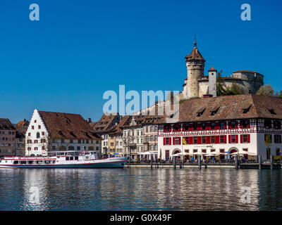 View above the Rhine river on the promenade with the restaurant Güterhof and the fortress Munot, Old Town, Schaffhausen, Canton  Stock Photo