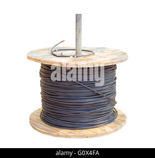 black electric cable wires in wood roll isolated on white background with clipping path Stock Photo