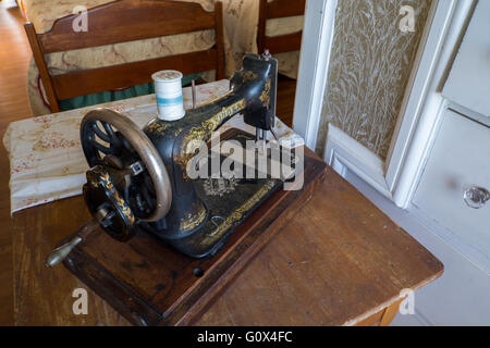 New York, Thousand Islands. Chippewa Bay, Singer Castle on Dark Island, interior. Antique sewing machine. Editorial Use Only. Stock Photo
