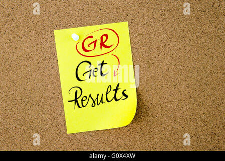 Business Acronym GR Get Results written on  yellow paper note pinned on cork board with white thumbtack, copy space available Stock Photo