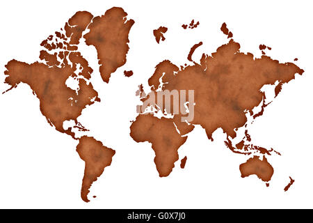 Old vintage darkened brown paper world map isolated on white background Stock Photo