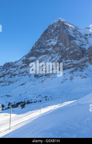 The famous Eiger north face in winter, seen from the train station Kleine Scheidegg Stock Photo