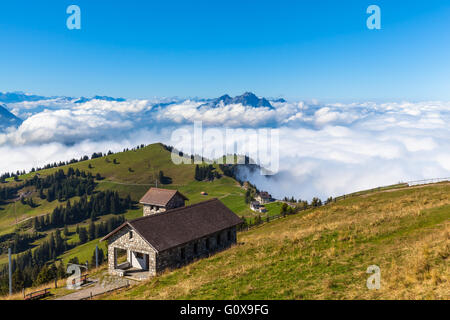 Stunning view on top of Rigi, with peak Pilatus and cloudscape in background, Canton of Lucerne, Switzerland. Stock Photo