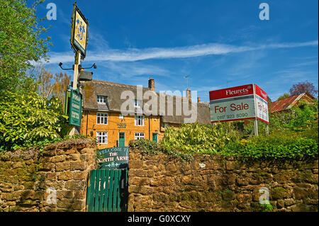 The North Arms pub in the centre of the Oxfordshire village of Wroxton like numerous other village pubs is closed. Stock Photo