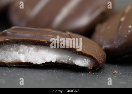 Chocolates with mint flavour cream filling on slate Stock Photo