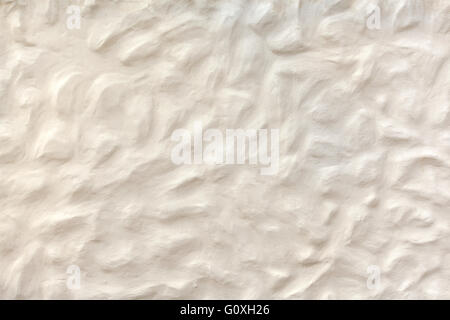 White beige plasterwork with bumpy surface Stock Photo