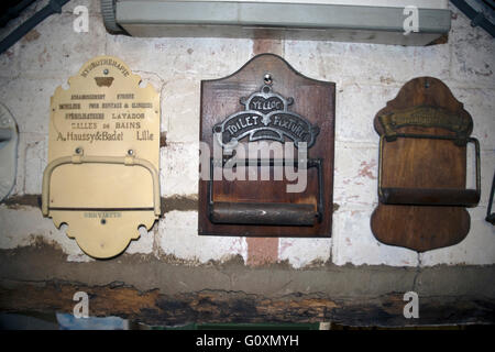 Old toilet roll holders from the Thomas Crapper Collection, Stratford upon Avon, Warwickshire, England Stock Photo