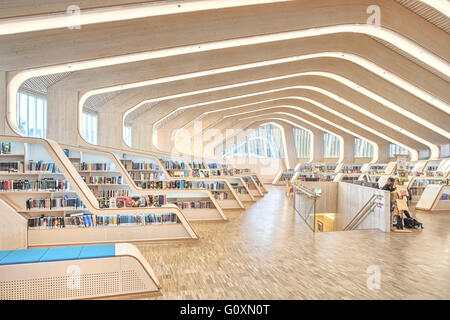 The large communal public building, the Vennesla Library, a library, cafe⌐, meeting place and administrative space in the town square. Stock Photo