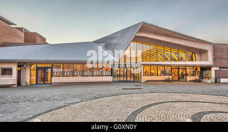 The large communal public building, the Vennesla Library, a library, cafe⌐, meeting place and administrative space in the town square. Stock Photo