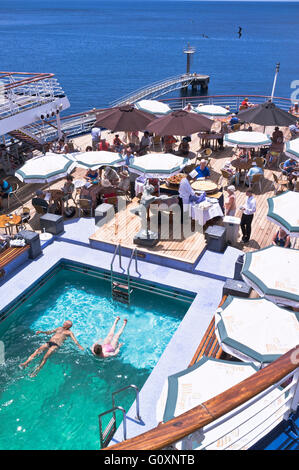 dh CMV Marco Polo cruise ship CRUISING TRAVEL Liner Deck passengers swimming pool buffet relaxing holiday on board cruise Stock Photo