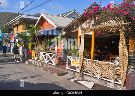 dh Bequia island ST VINCENT CARIBBEAN Caribbean beach bar and tourists Port Elizabeth grenadines Stock Photo
