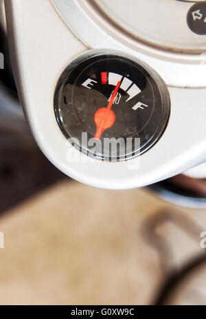 Motorcycle fuel gage displays at middle point Stock Photo