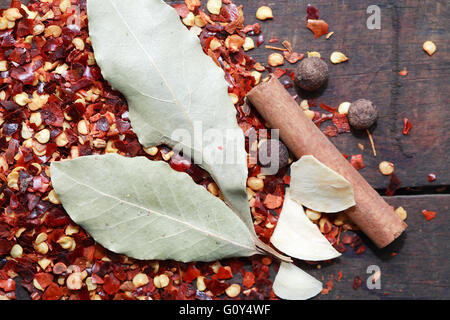 Set of various spice ingredients on old wooden background Stock Photo