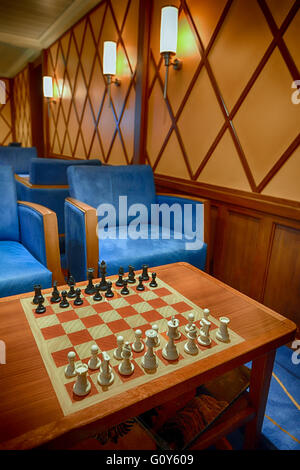 Living room interior and chess game on a widescreen television Stock ...